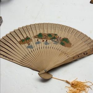 Vintage wooden folding fan